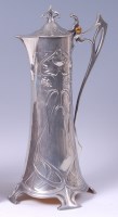 Lot 244 - A WMF Art Nouveau pewter claret jug, the...