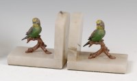 Lot 266 - A pair of Art Deco onyx and cold painted...