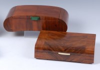 Lot 269 - An Art Deco figured walnut hinged top cigar...