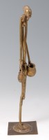 Lot 285 - In the style of Alberto Giacometti - a bronze...