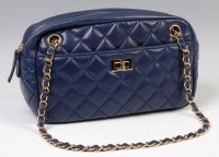 Lot 301 - A Chanel navy blue quilted leather small...