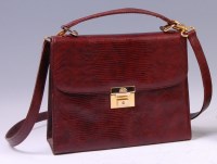 Lot 315 - A Louis Feraud brown snakeskin handbag, having...