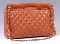 Lot 317 - A large Chanel tan leather quilted shoulder...