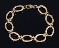 Lot 219 - A circa 1970s 14ct heavy gold bracelet, of...