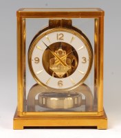 Lot 261 - A Jaeger LeCoultre lacquered brass Atmos clock,...