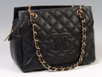 Lot 300 - A Chanel Petite Timeless tote bag, quilted...