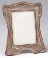 Lot 194 - An Art Nouveau applied and embossed silver...