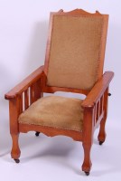 Lot 415 - An Arts & Crafts oak open armchair, having...