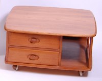 Lot 421 - An Ercol blond elm 'Pandora's Box' coffee...