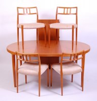 Lot 429 - A 1960s Danish teak dining suite by Skovmand &...