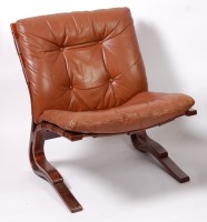 Lot 437 - A 1970s Danish formed laminate tan leather...