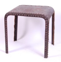 Lot 459 - A contemporary riveted steel side table,...