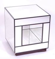 Lot 460 - A 1980s mirrored glass low 'cube' table,...