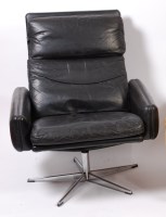 Lot 485 - A 1960s Danish black leather swivel armchair,...