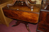 Lot 1438 - A circa 1830 flame mahogany and cross banded...