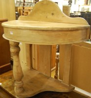 Lot 1457 - A reclaimed pine demi-lune ledge back two tier...