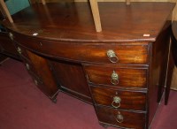 Lot 1463 - A 19th century mahogany bowfront kneehole desk,...