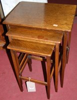 Lot 1469 - An oak nest of three occasional tables