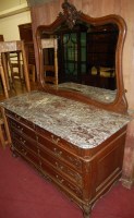 Lot 1472 - A late 19th century French carved oak bevelled...