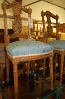 Lot 1475 - A pair of French carved beech salon chairs,...