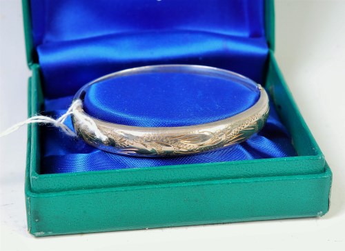 Lot 304 - A boxed Excalibur sterling silver hinged...