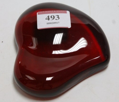 Lot 493 - A Tiffany & Co red glass heart shaped paperweight