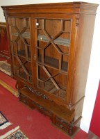 Lot 1186 - A late Victorian oak bookcase, having...