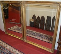 Lot 1187 - A pair of contemporary gilt framed and...