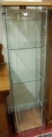 Lot 1192 - A contemporary four-sided glass freestanding...