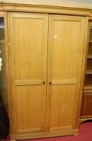 Lot 1207 - A contemporary light oak round cornered double...