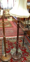 Lot 1210 - Two turned standard lamps