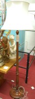 Lot 1211 - A contemporary reeded and turned pine standard...
