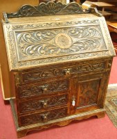Lot 1220 - An early 20th century low relief heavily...