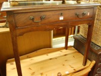 Lot 1222 - A George III mahogany single drawer side table,...