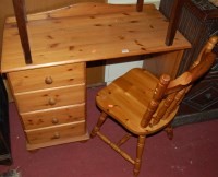 Lot 1224 - A modern pine single pedestal ledgeback desk;...