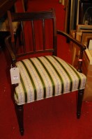Lot 1230 - A Regency style mahogany barback single elbow...