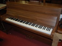 Lot 1235 - A contemporary Tokai upright piano,...