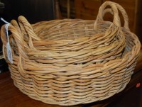 Lot 1241 - A set of three graduated wicker baskets