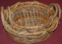 Lot 1248 - A set of two graduated wicker baskets