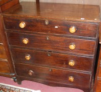 Lot 1278 - An early 19th century mahogany chest of four...