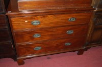 Lot 1280 - A 19th century mahogany chest of three long...