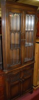 Lot 1281 - A moulded oak and lead glazed freestanding...