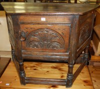 Lot 1309 - A 17th century style joined oak single door...