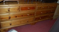 Lot 1315 - A modern pine long low sideboard, fitted with...