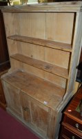 Lot 1317 - A Victorian pine dresser, having twin lower...