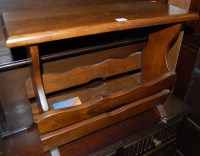 Lot 1322 - An oak magazine table