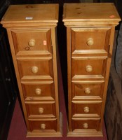 Lot 1324 - A pair of modern pine narrow single door CD...