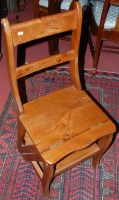 Lot 1331 - A contemporary pine metamorphic library chair
