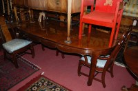 Lot 1342 - A contemporary Chinese burr wood dining suite...