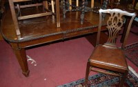Lot 1345 - An Edwardian mahogany extending dining table...
